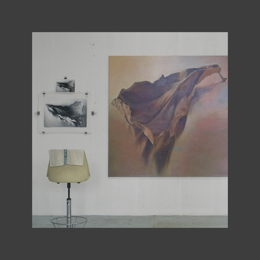 studio wall with painting and other work